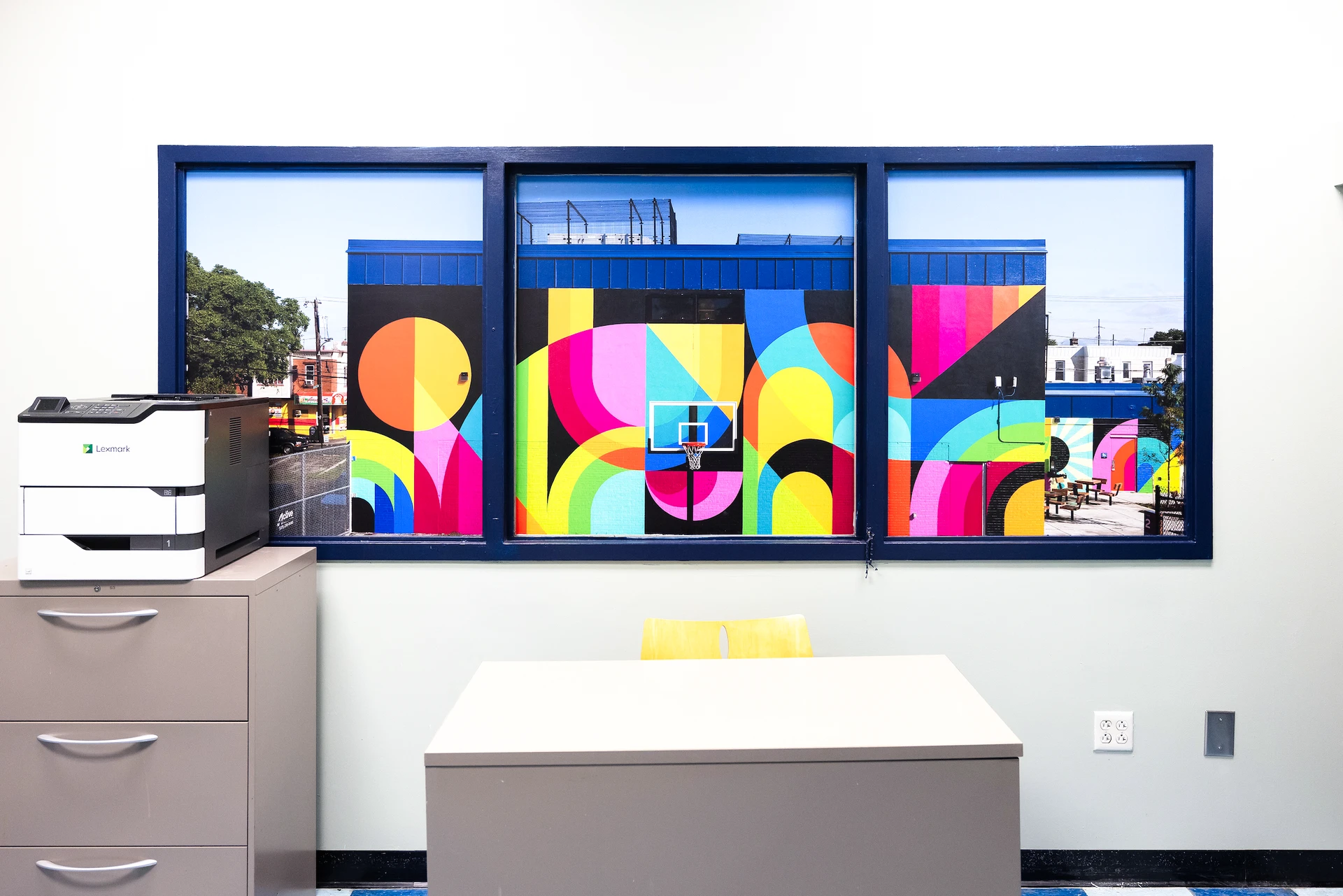 Framed wall graphics of murals throughout Philadelphia