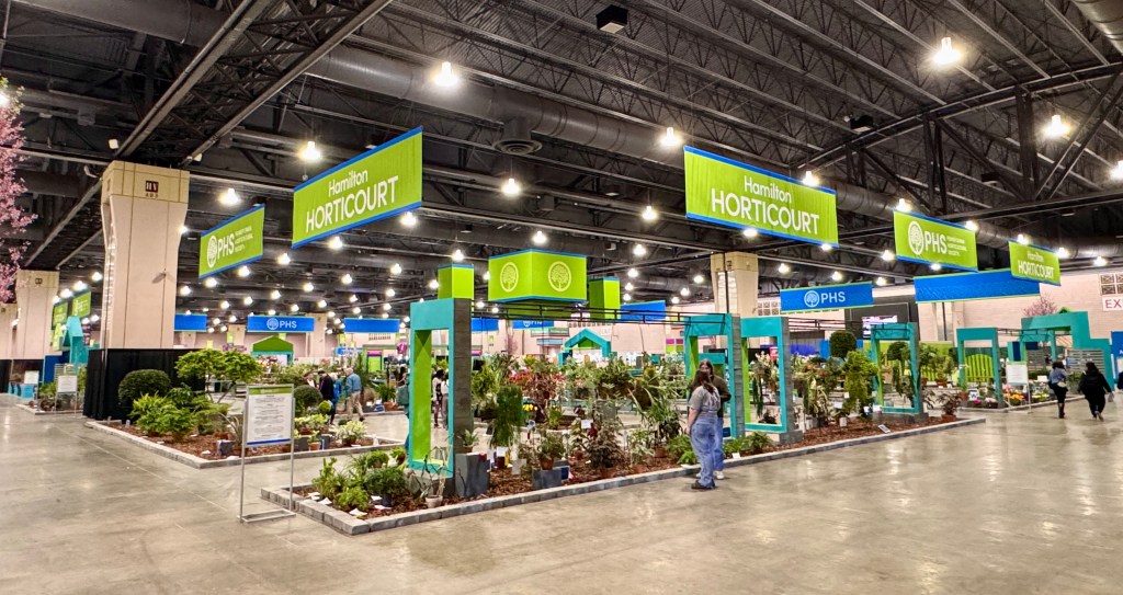 Custom large banners installed overhead for PHS show in Philadelphia