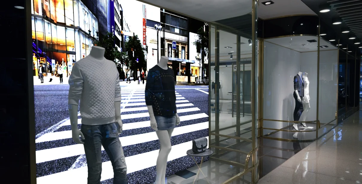 Backlit SEG fabric light box in a retail window display, printed by Color Reflections