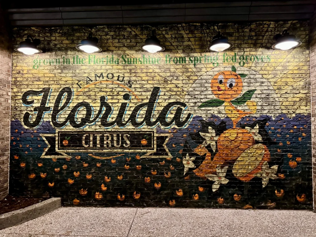 a vibrant mural painted on a brick wall